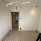 Electrician rewiring a home in East Sussex – full and partial rewire services in Bexhill, Eastbourne, Hastings, NICEIC certified, house rewire near me