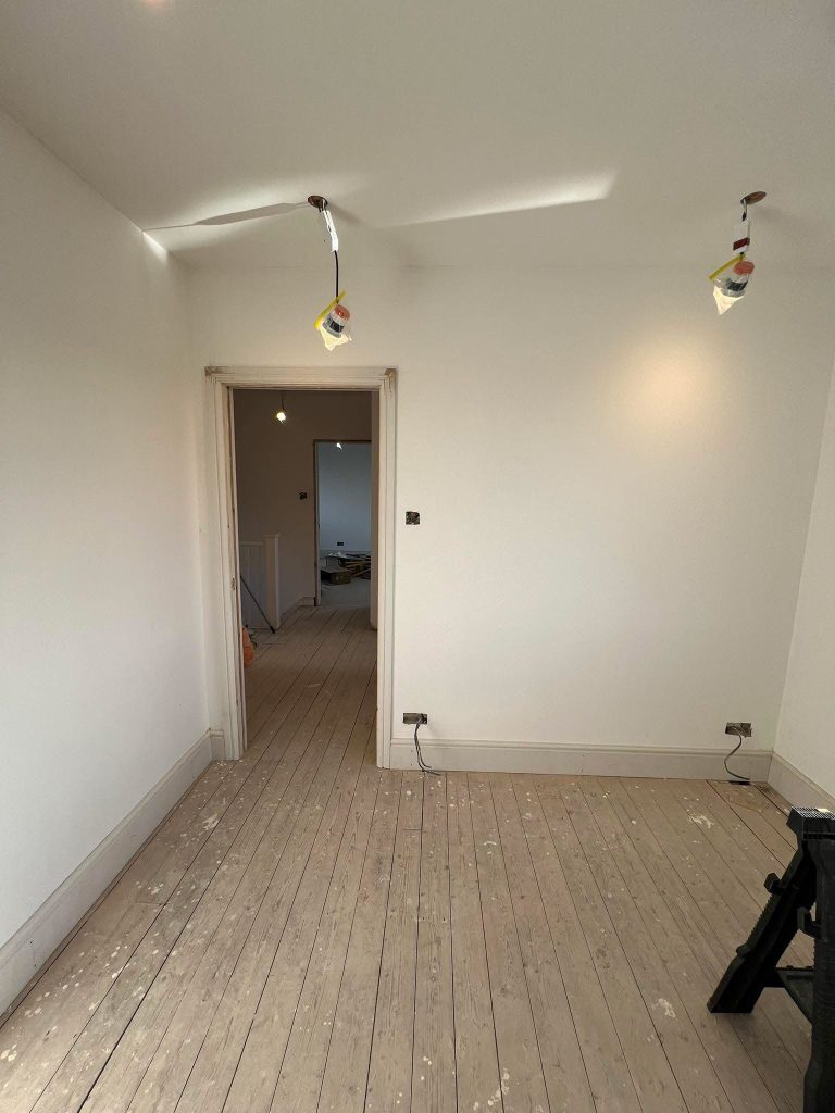 Electrician rewiring a home in East Sussex – full and partial rewire services in Bexhill, Eastbourne, Hastings, NICEIC certified, house rewire near me