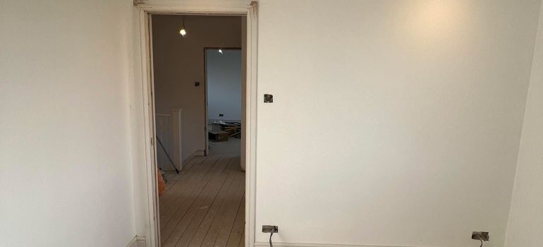 Electrician rewiring a home in East Sussex – full and partial rewire services in Bexhill, Eastbourne, Hastings, NICEIC certified, house rewire near me